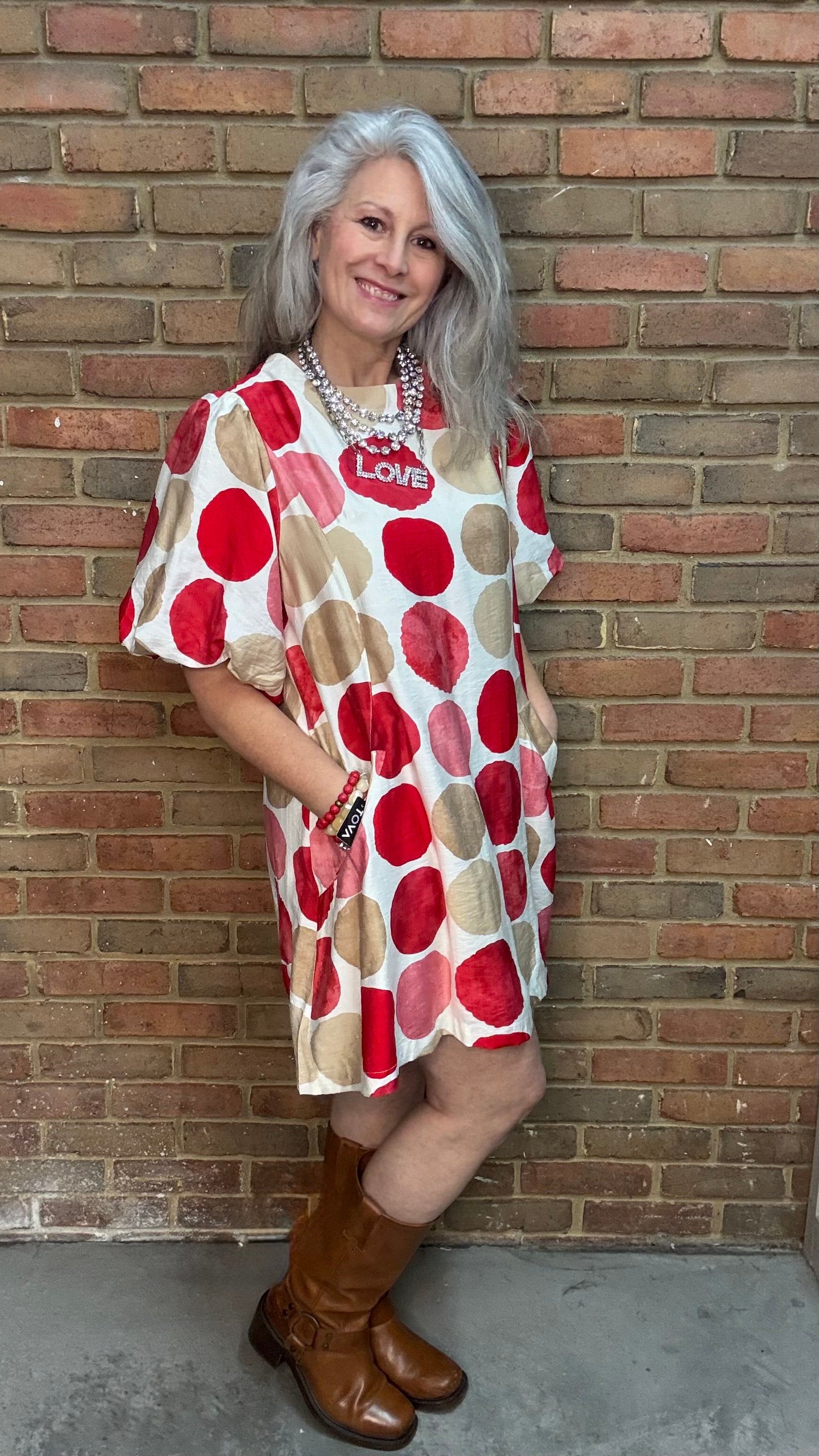 Woman wearing Red Mix Bubble Sleeve Mini Dress with Toolie Shoe Beige