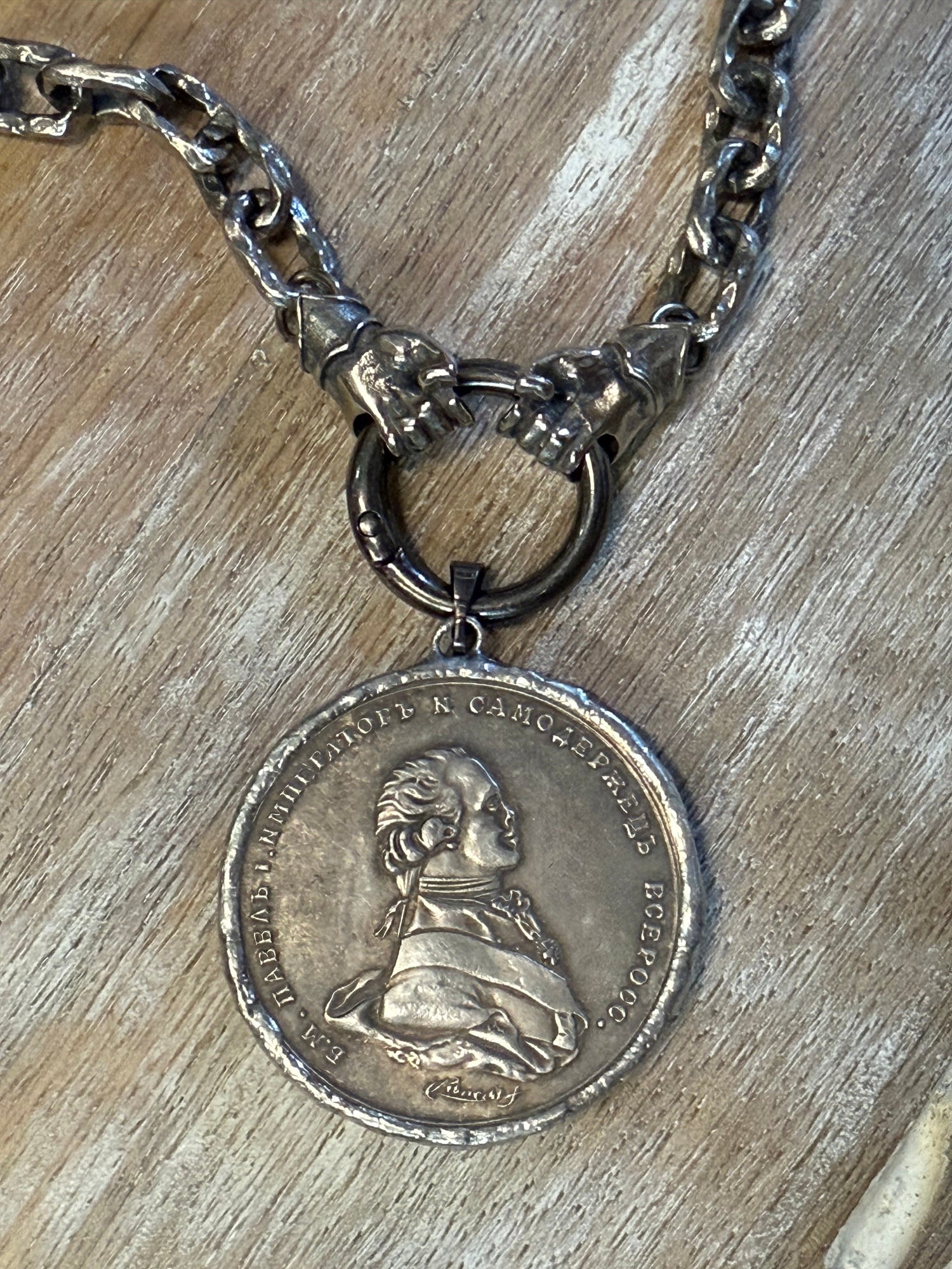 Hands on Cross Coin Necklace