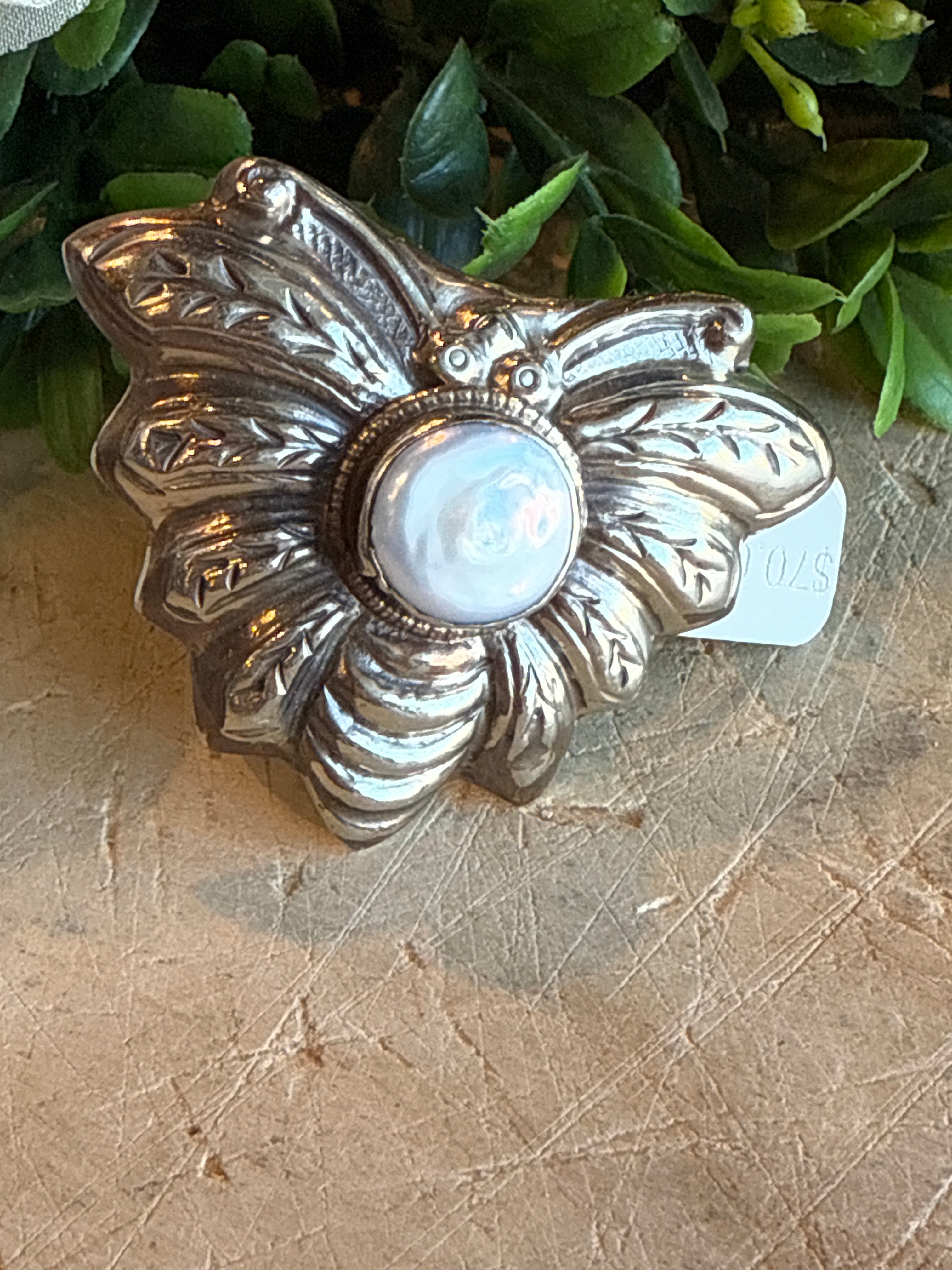 Mother of Pearl Bee Ring Displayed on solid background