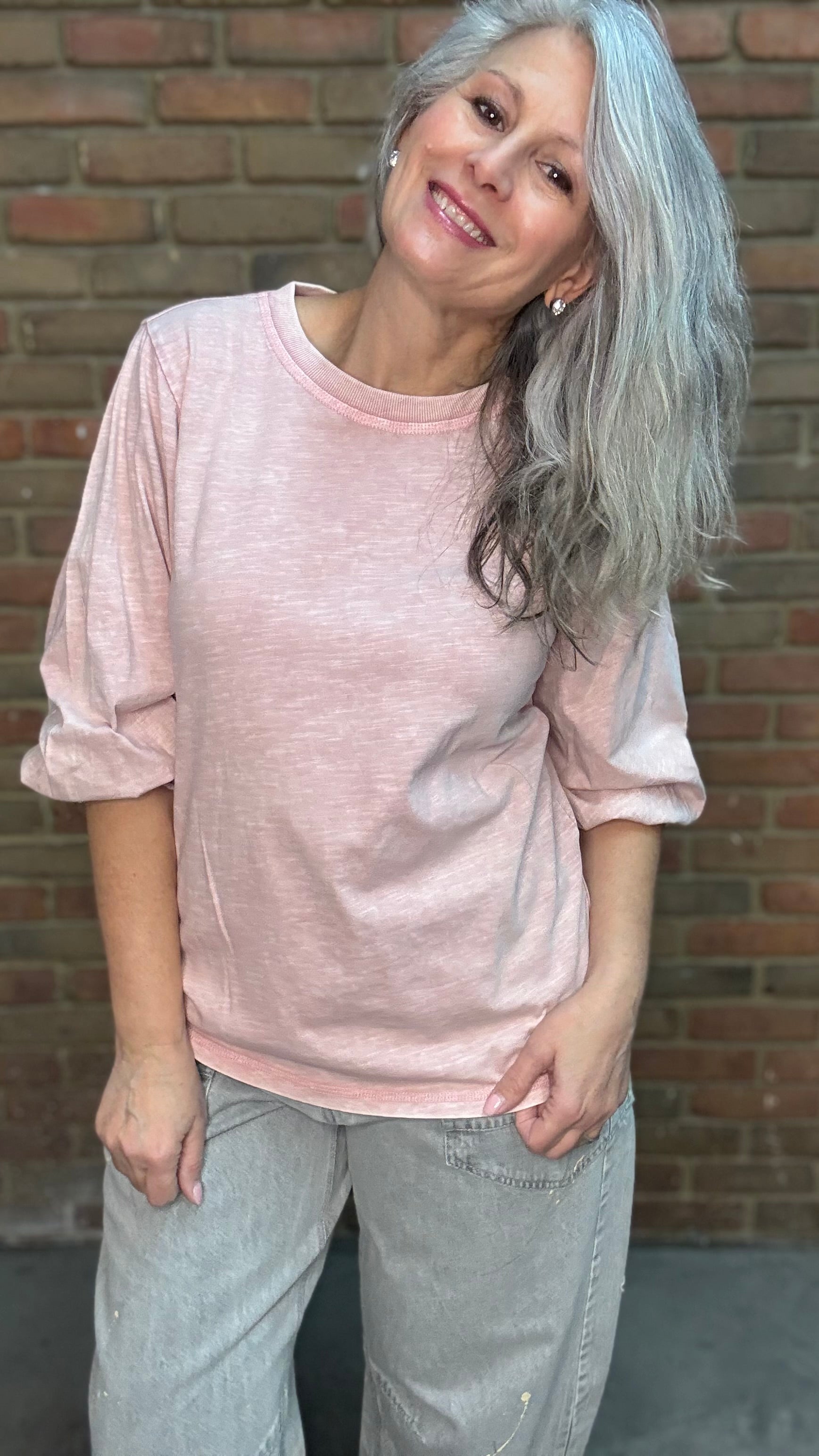Woman wearing the Basic Long Sleeve Crew Neck Top in Pink Salt paired with Oyster Grey Big Pocket Jeans