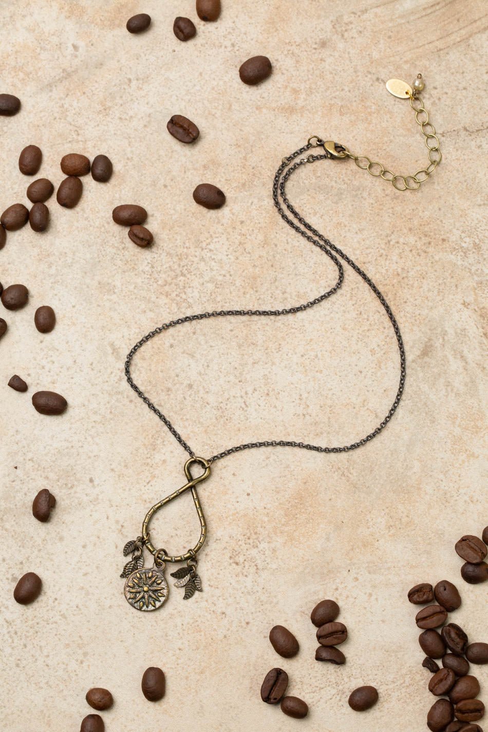 Espresso 16.5 - 18.5" Organic Hammered Ring With Mandala Charm And Antique Brass Leaves Cluster Necklace - Vintage Vault Boutique