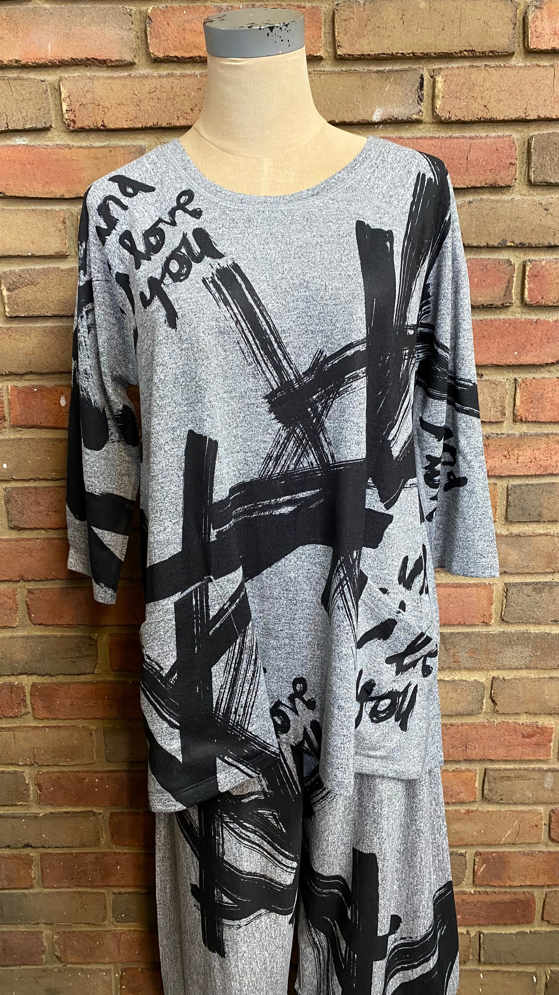 A long sleeve top with a &