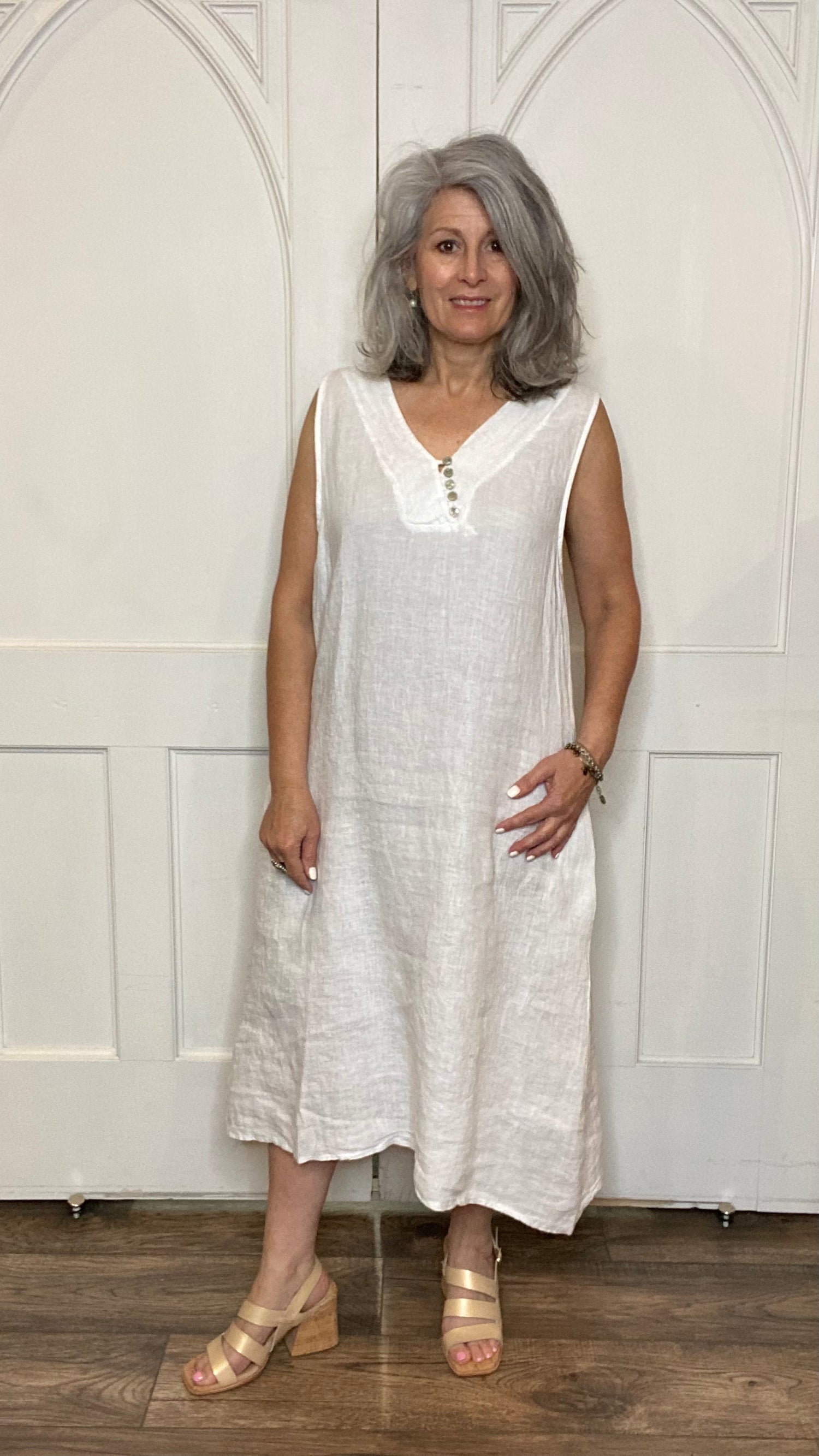 Sleeveless White 5-Button Dress