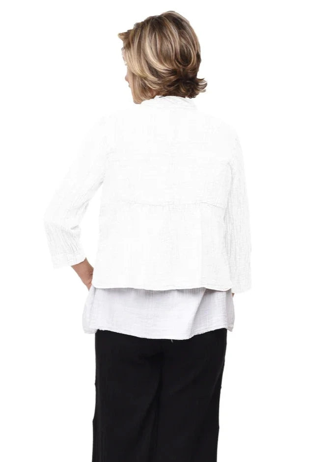 Back view of model wearing the white Landon jacket.