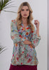Front view of Dragonfly Silk Shirt on a model. The models arms are crossed with the long sleeves rolled up.