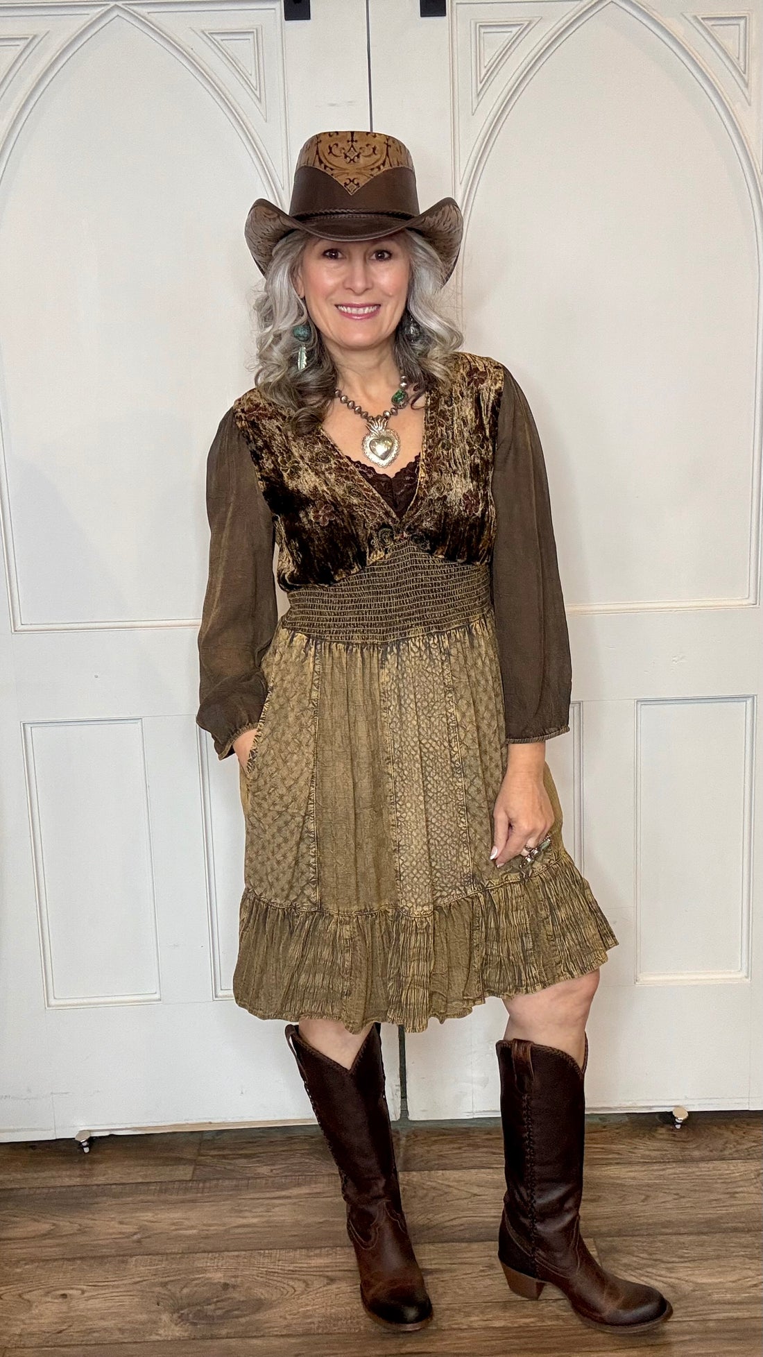 Woman in Amber Smocked Patchwork Babydoll dress and Lane&