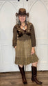 Woman in Amber Smocked Patchwork Babydoll dress and Lane&