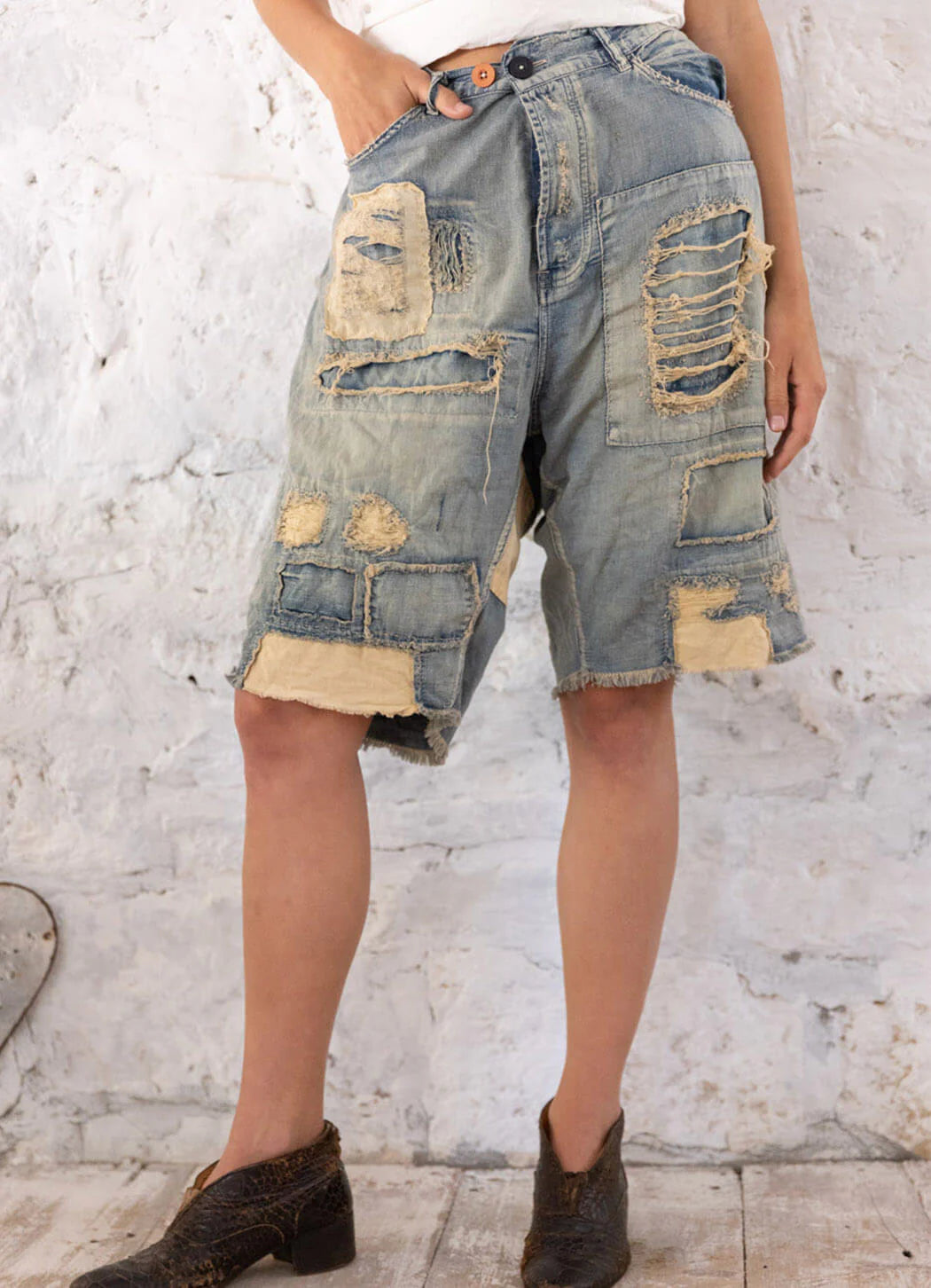 front view of Miner Denim Shorts on a model.