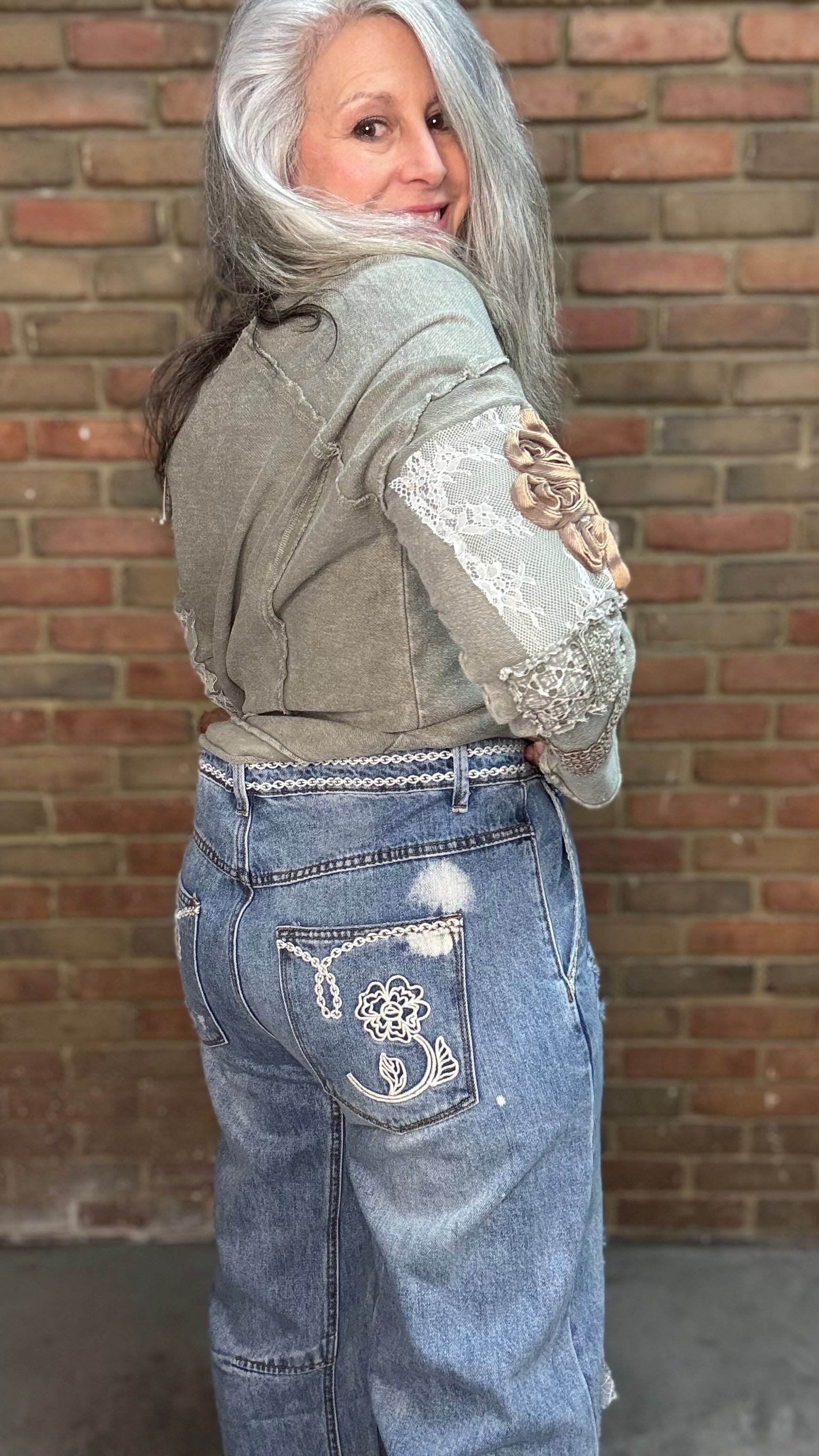 Woman wearing Olive Embellished Sleeve Top and Floral Embroidered Relaxed Jean 1083