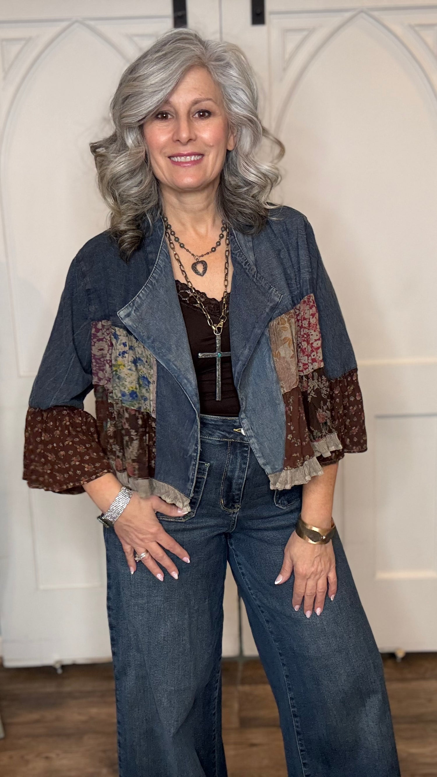 Woman wearing the Vintage Lapel Crop Jacket with Judy Blue Palazzo Patch Pocket Jeans, standing against a white background.