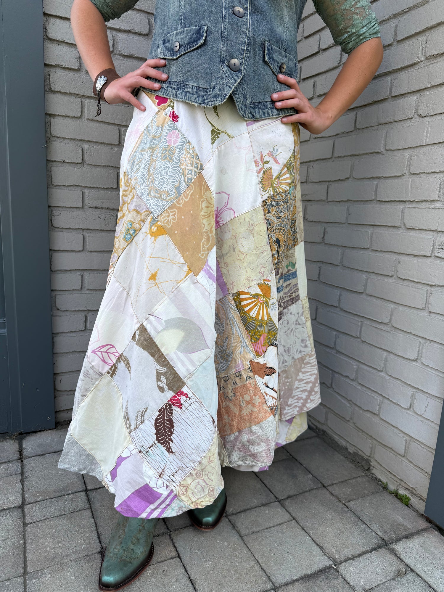 Woman wearing a patchwork wrap skirt.