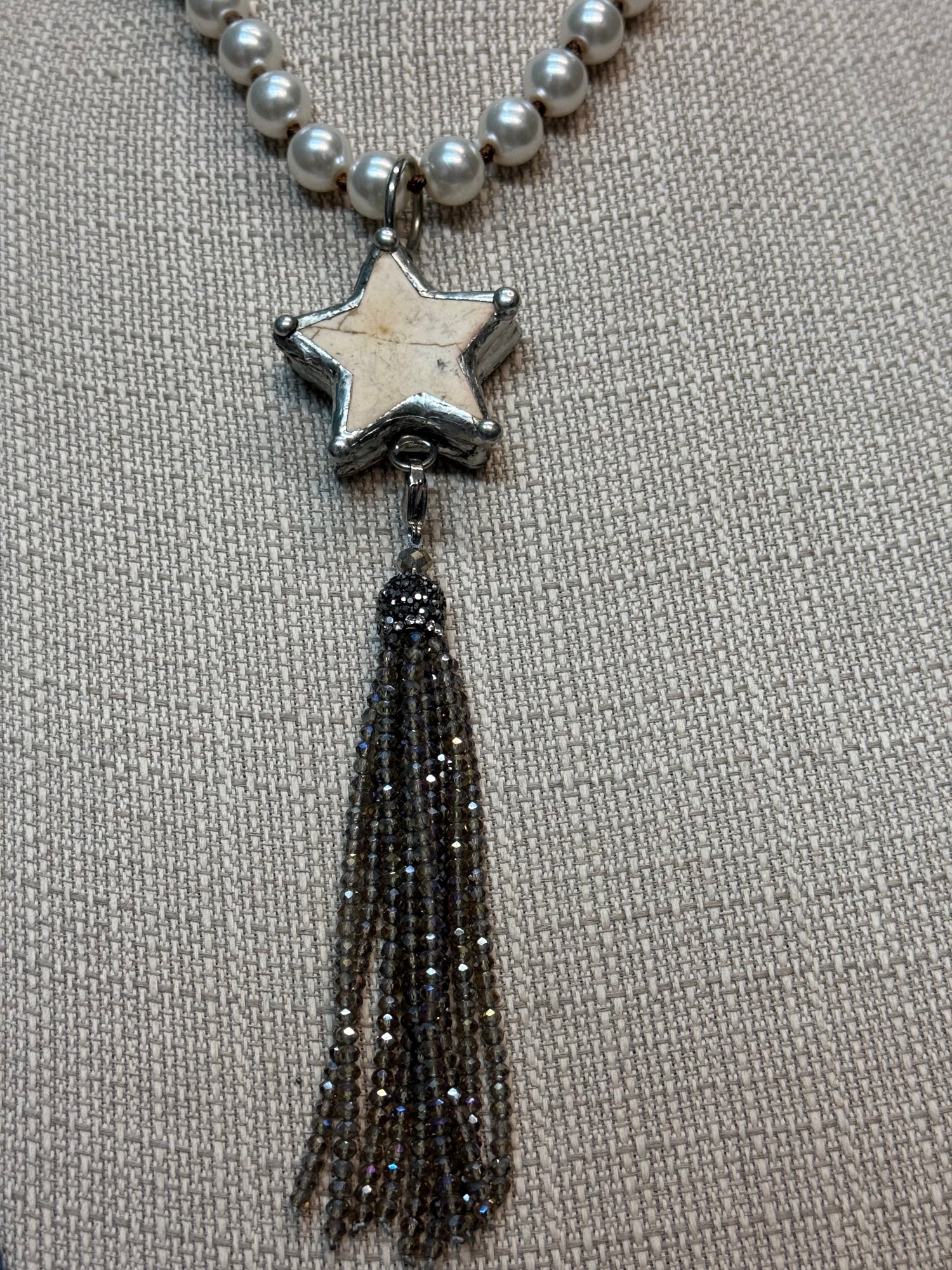 Star with Tassel on Pearl Necklace
