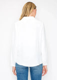 Back view of Wilma Tie Front Crepe Top on model wearing with blue jeans.