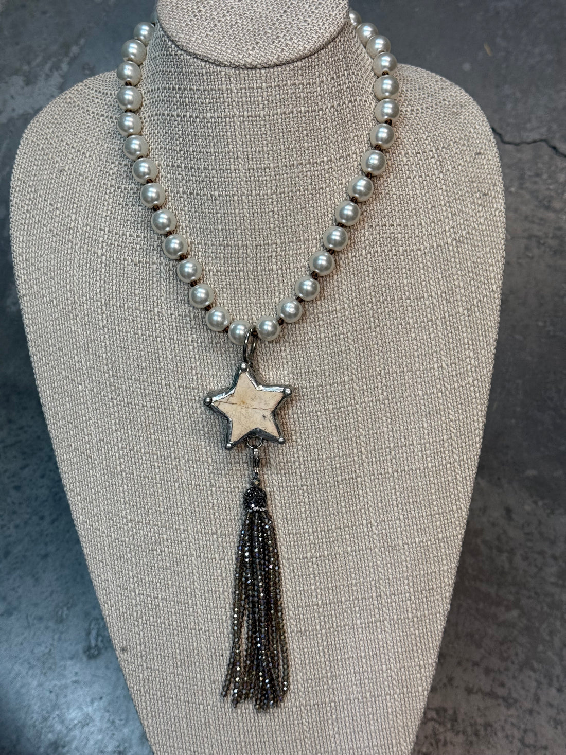 Star with Tassel on Pearl Necklace