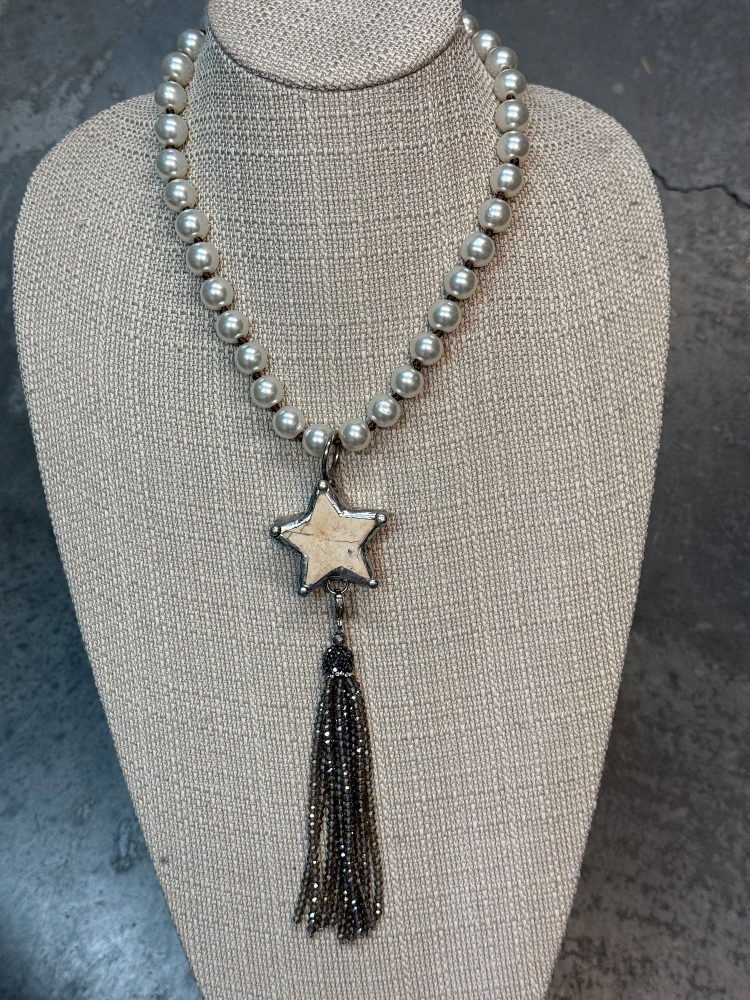 Star with Tassel on Pearl Necklace