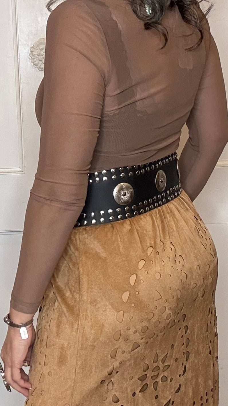 Woman wearing the Wide Triangle Buckle Belt in black with Camel Faux Suede Fringe Skirt.