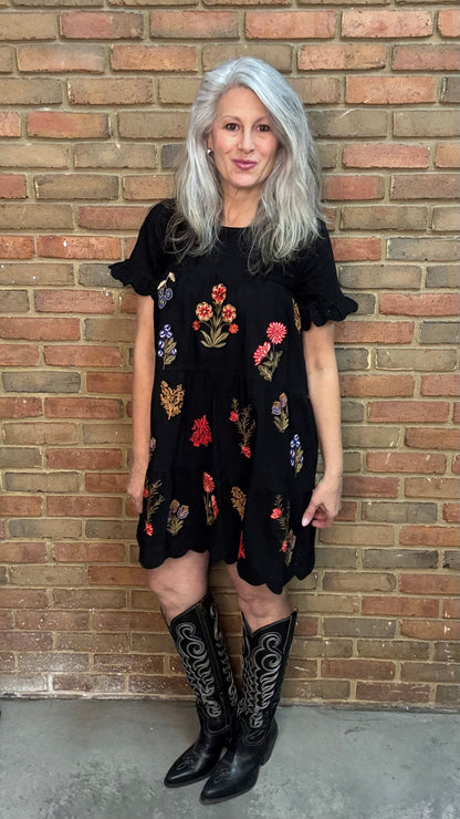 Woman wearing Embroidered Tiered Keyhole Dress paired with Ebony Stitched Western Tall Boots