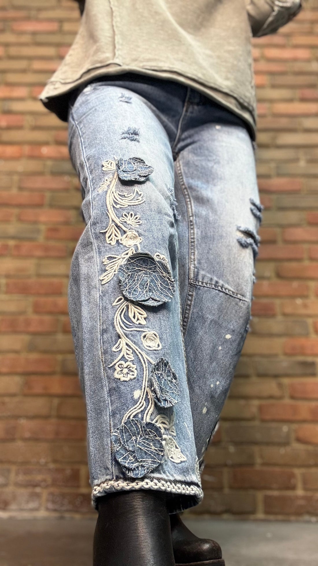 Woman wearing Olive Embellished Sleeve Top and Floral Embroidered Relaxed Jean 1083