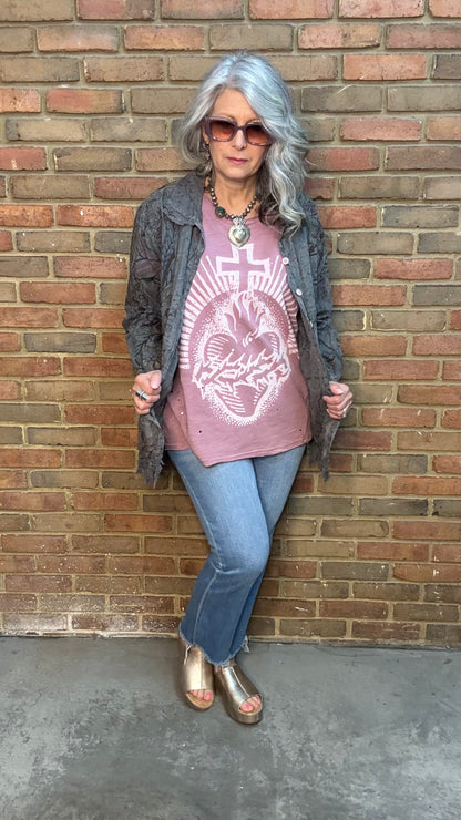 Woman wearing Moon Dance Tee - Cherished Heart tee against brick wall.