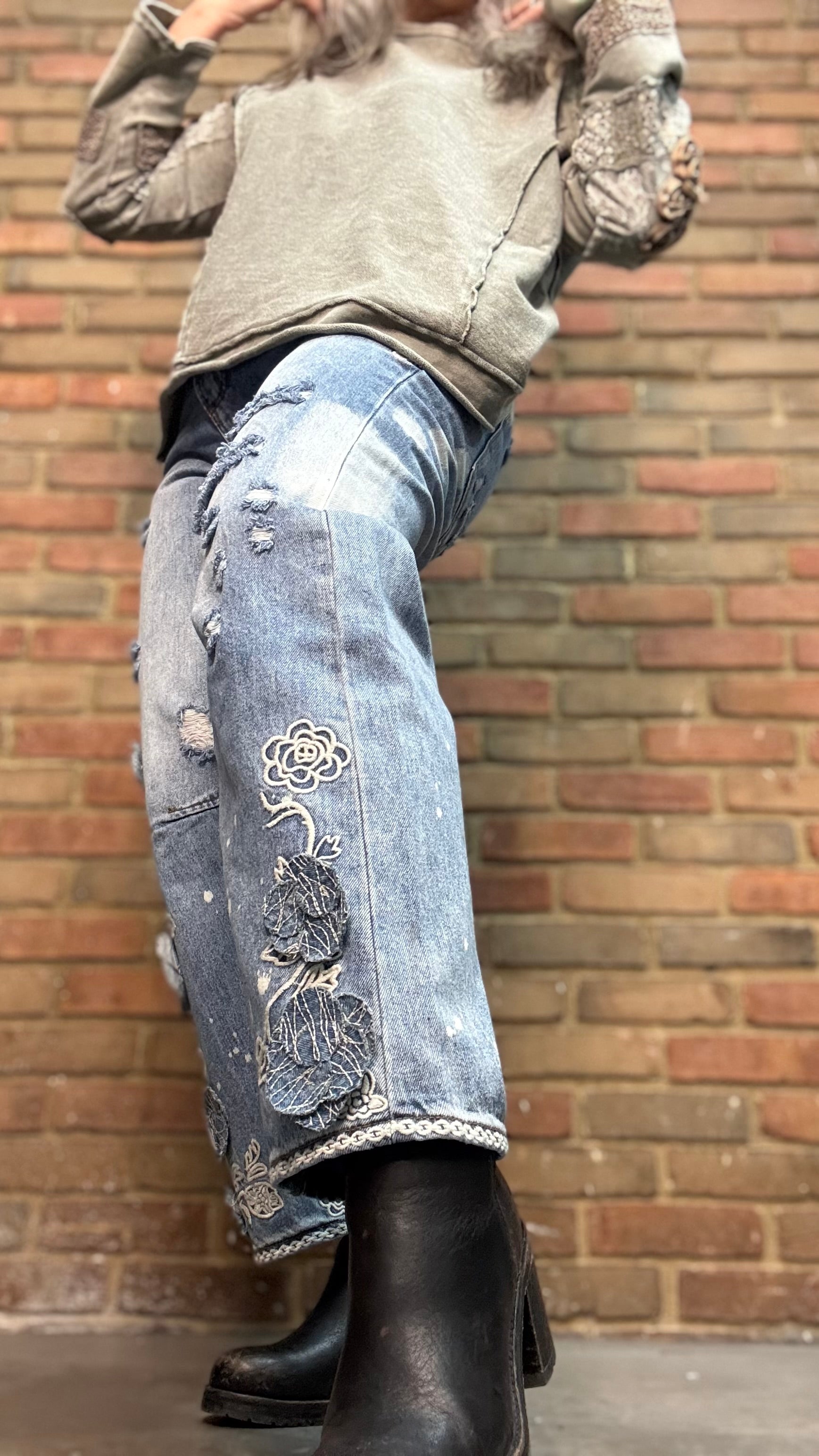 Woman wearing Olive Embellished Sleeve Top and Floral Embroidered Relaxed Jean 1083