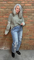 Woman wearing Olive Embellished Sleeve Top and Floral Embroidered Relaxed Jean 1083