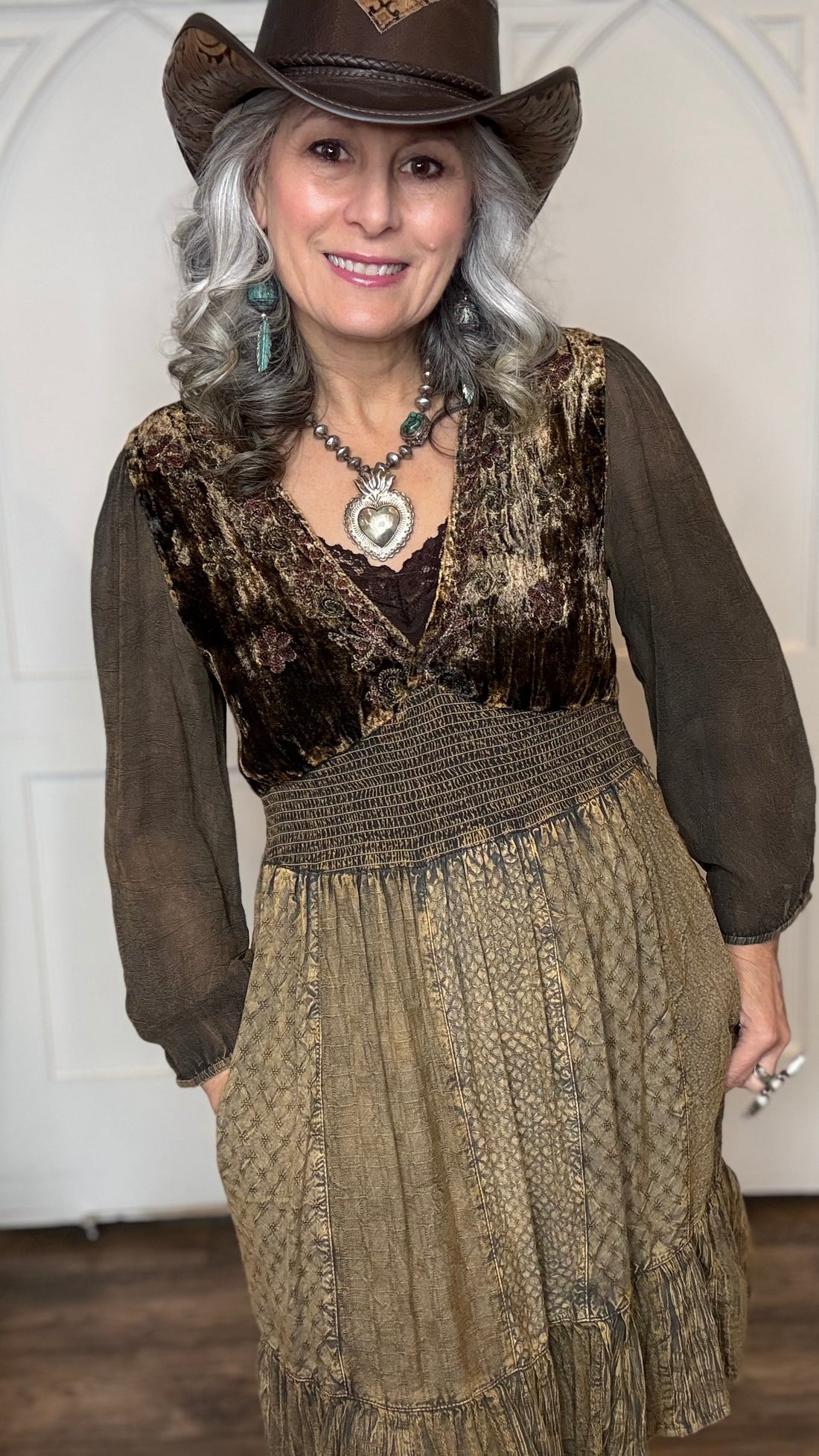 Woman in Amber Smocked Patchwork Babydoll dress and Lane&