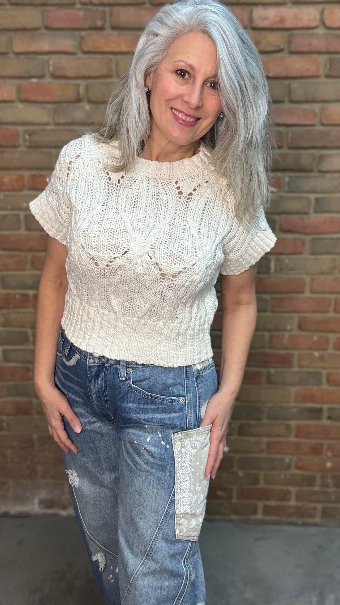 Woman wearing Oatmeal Sweater Top with Big Pocket Denim Pants