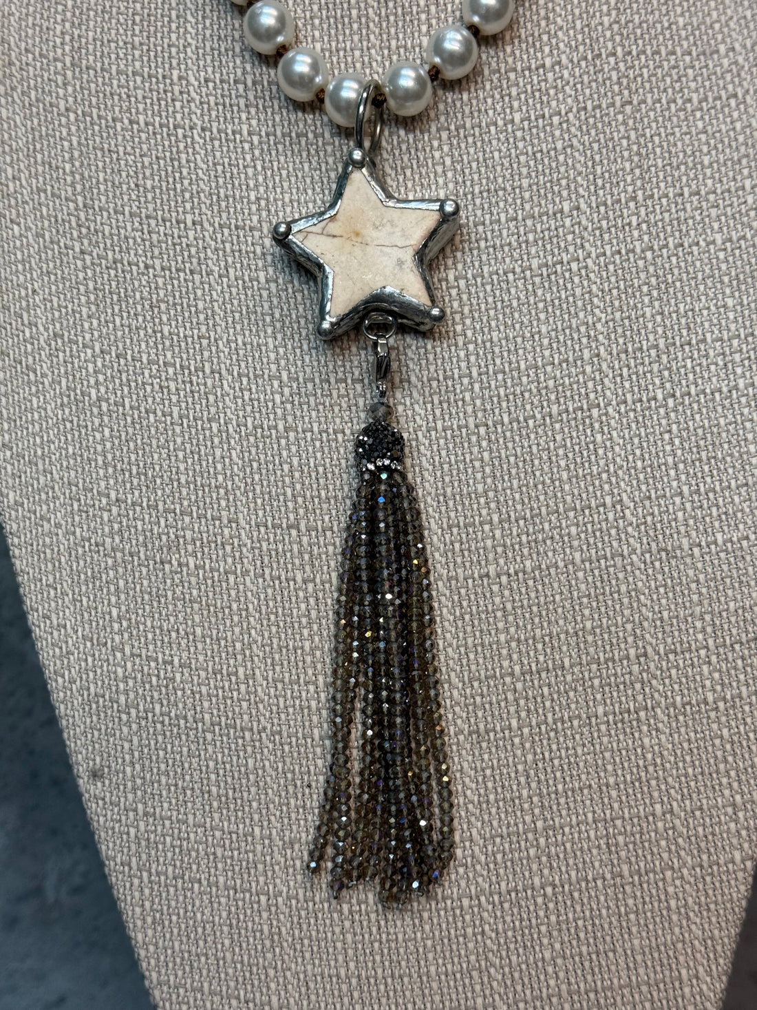 Star with Tassel on Pearl Necklace