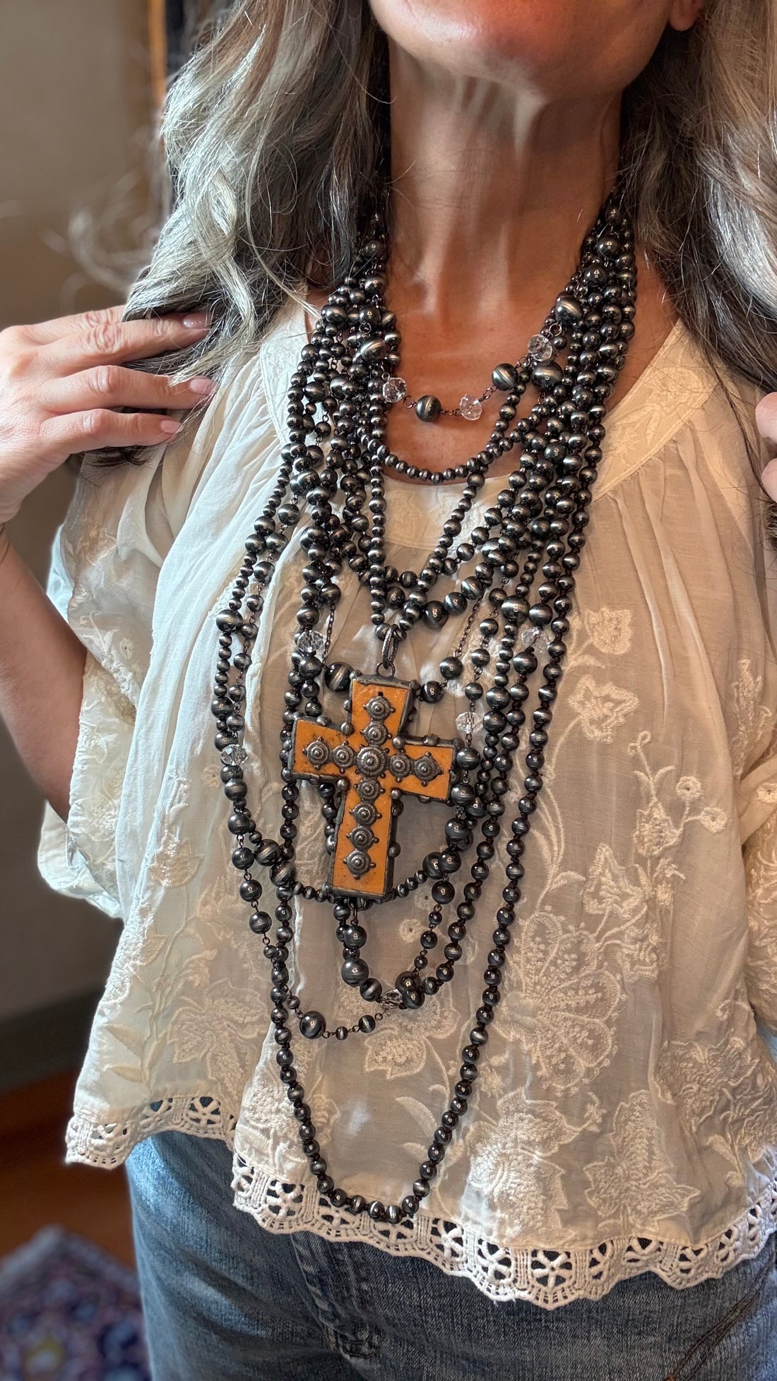 Orange Cross on Multi Strand Necklace