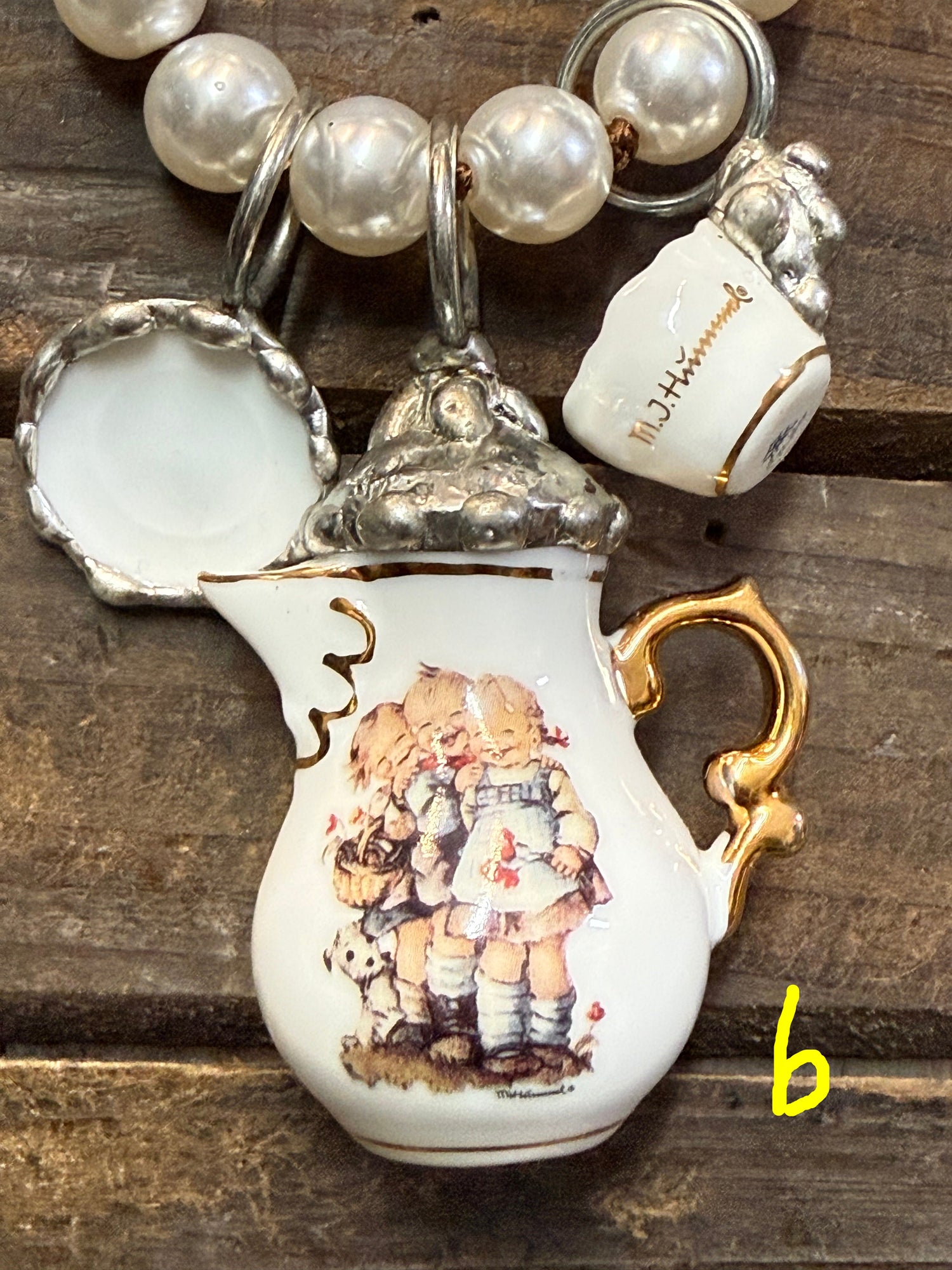 Decorative teapot with intricate design on a wooden surface