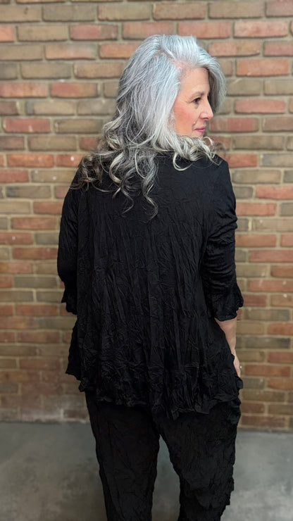 Person wearing Black Crinkle Side Pocket Pant and Black Solid Crinkle Tie Cardigan.