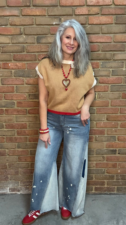 Woman wearing Chestnut Flame Sweater paired with Bleached Wide Leg Jeans and Heads Up - Red Shoes styled with XOXO heart on Red Bead Necklace