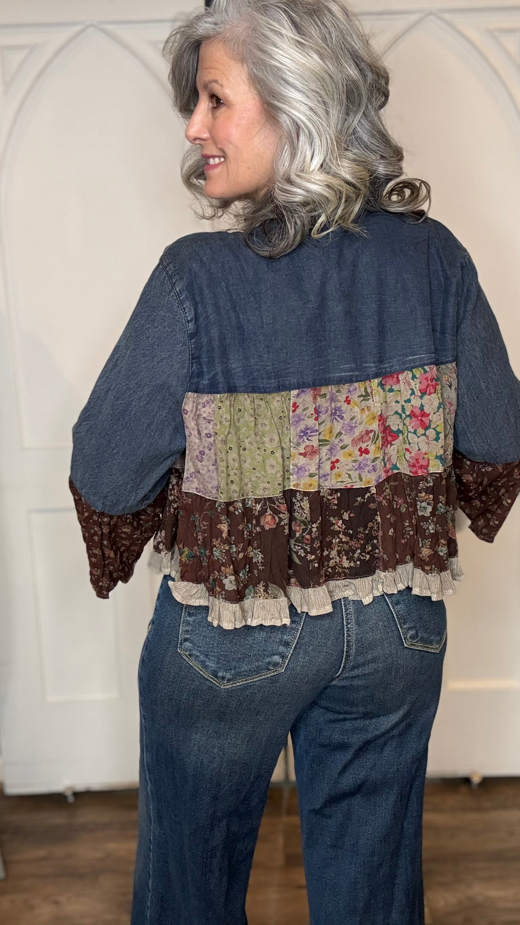 Woman wearing the Vintage Lapel Crop Jacket with Judy Blue Palazzo Patch Pocket Jeans, standing against a white background.