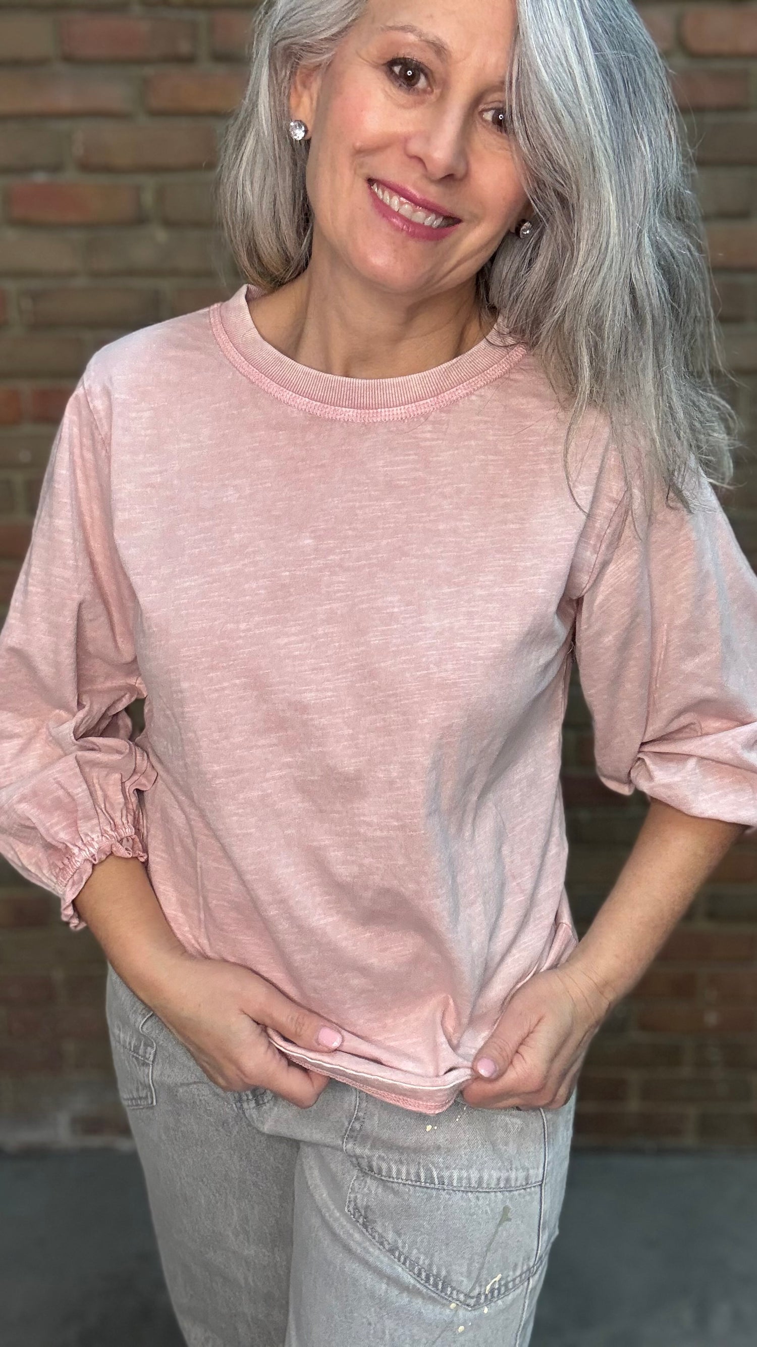 Woman wearing the Basic Long Sleeve Crew Neck Top in Pink Salt paired with Oyster Grey Big Pocket Jeans