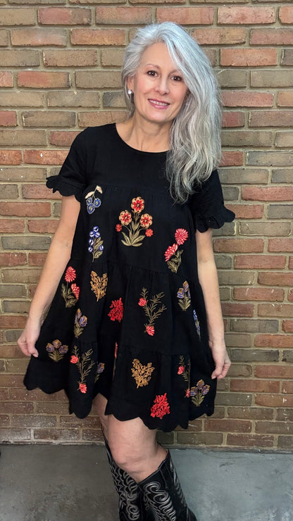 Woman wearing Embroidered Tiered Keyhole Dress paired with Ebony Stitched Western Tall Boots