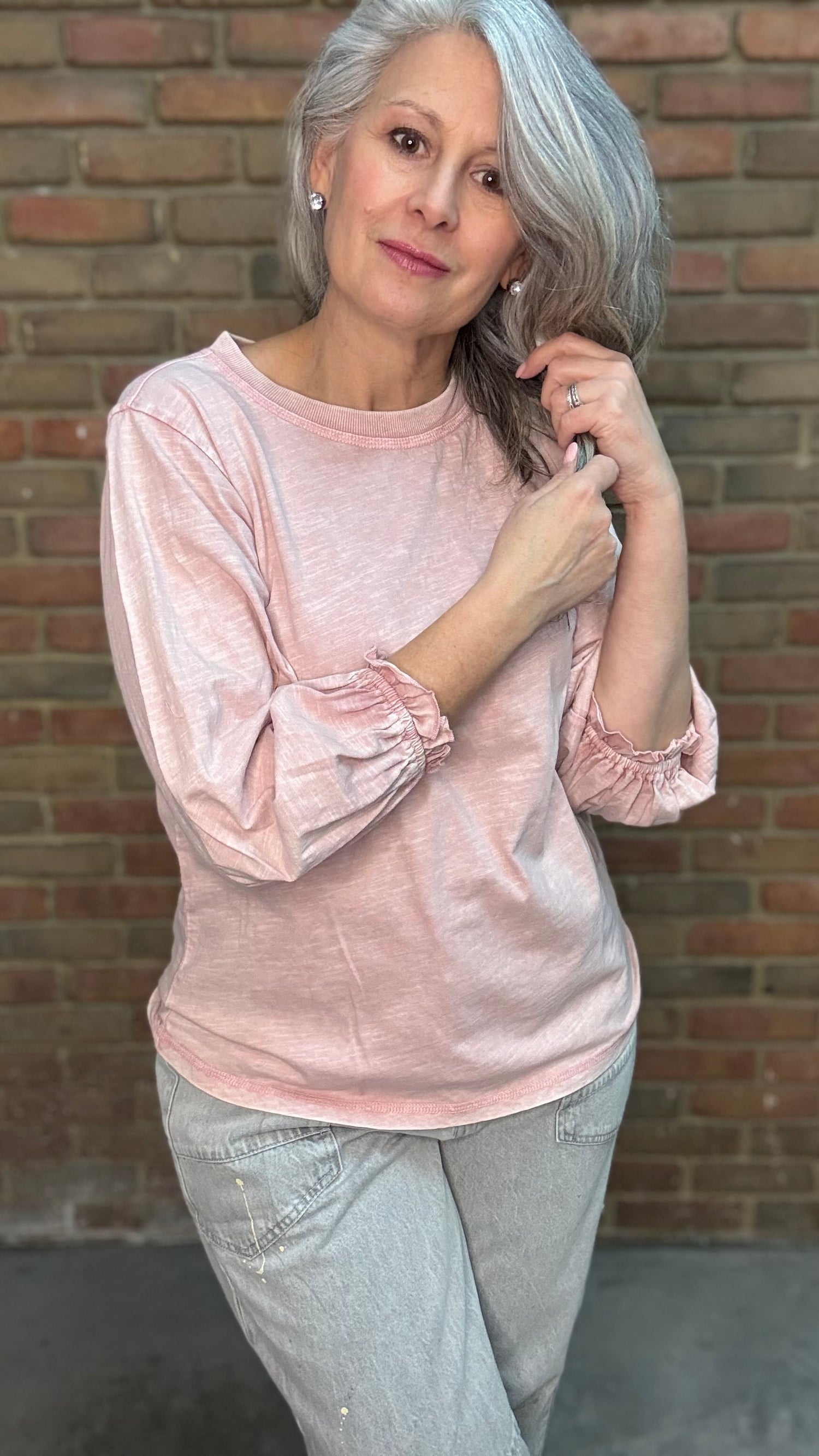 Woman wearing the Basic Long Sleeve Crew Neck Top in Pink Salt paired with Oyster Grey Big Pocket Jeans