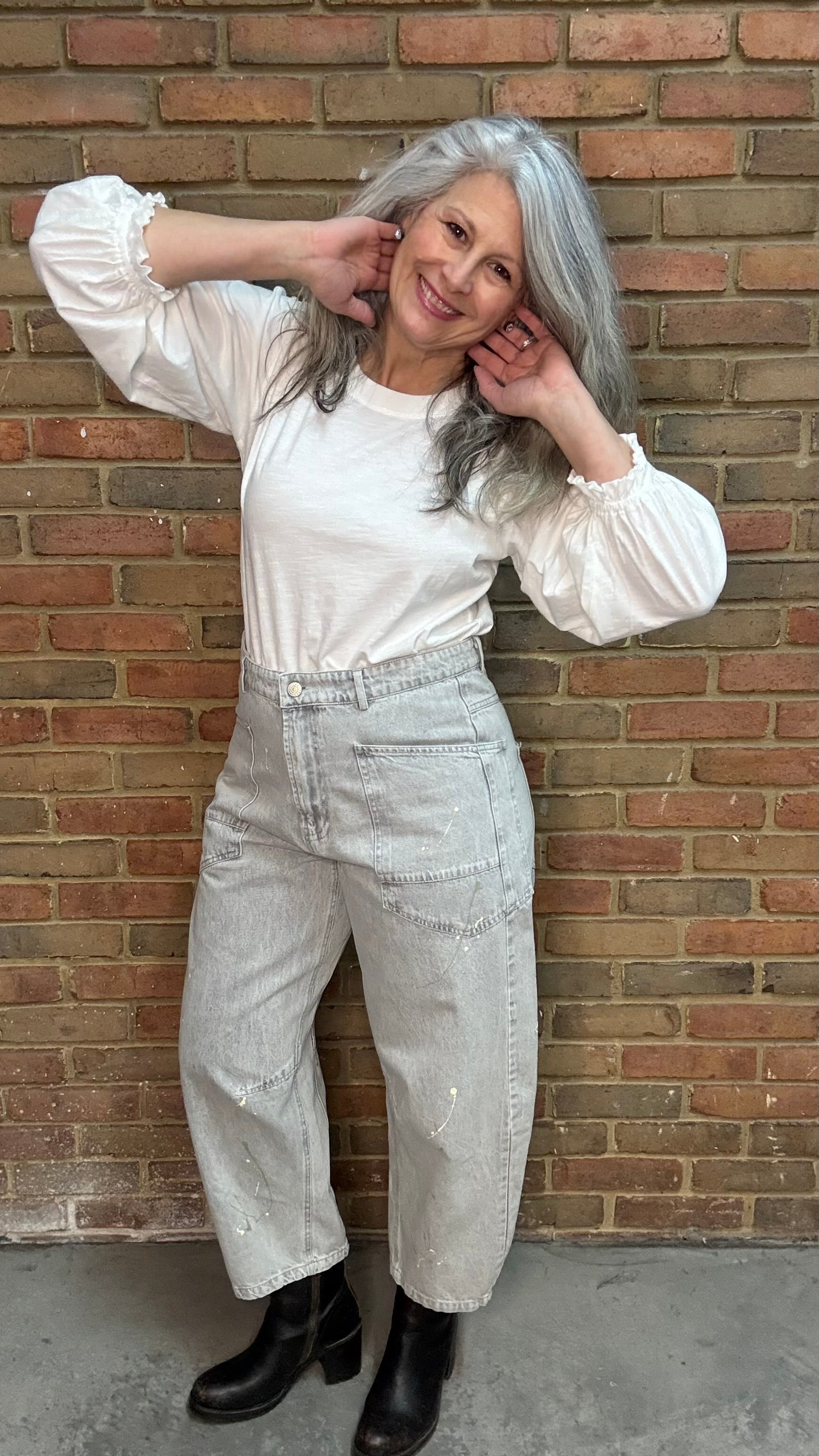 Person wearing Oyster Grey Big Pocket Jeans paired with Basic Long Sleeve Crew Neck Top