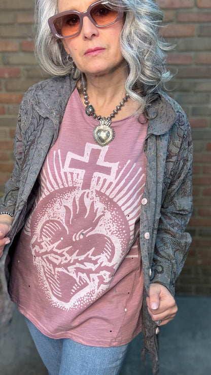 Woman wearing Moon Dance Tee - Cherished Heart tee against brick wall.