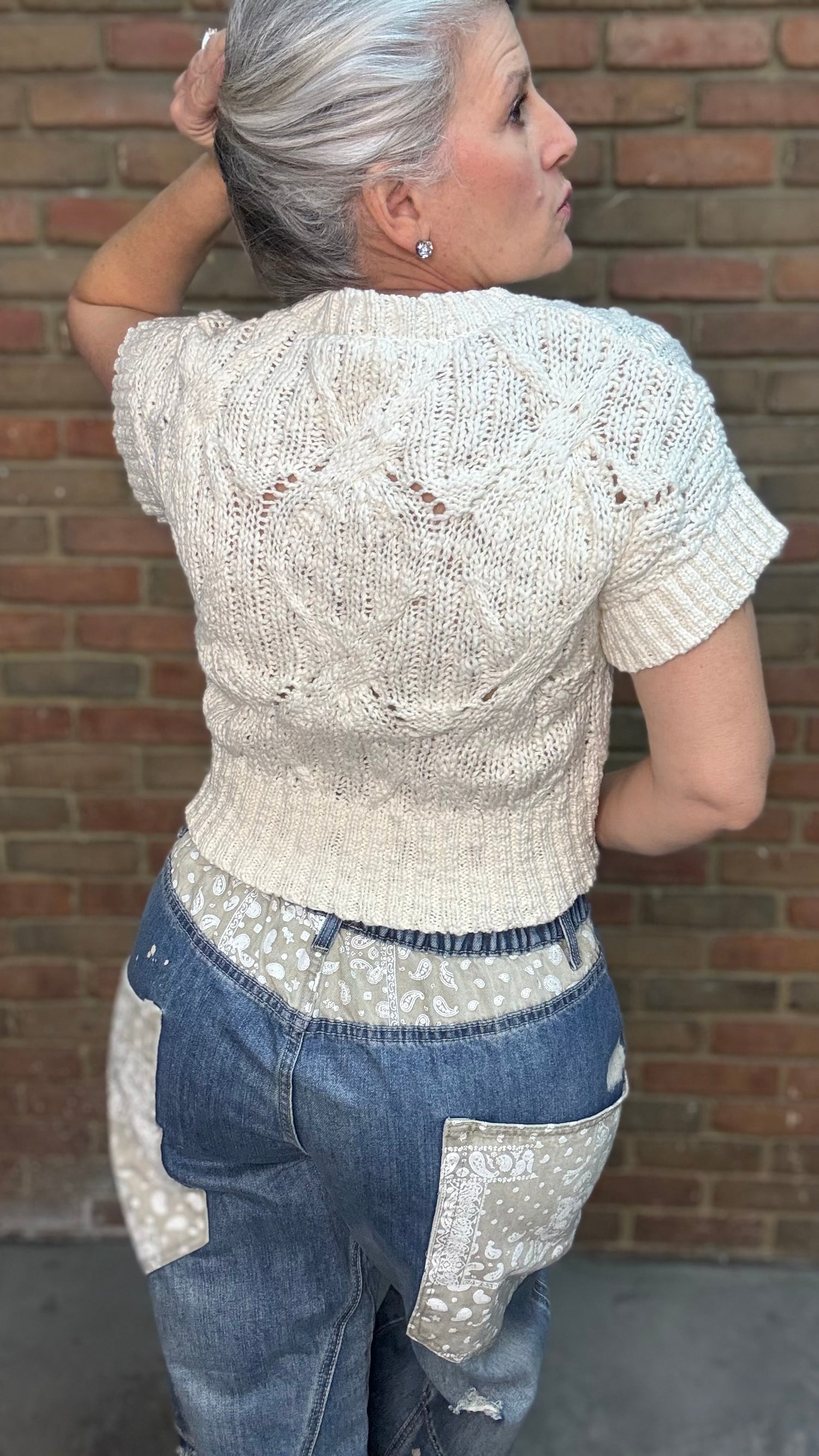 Woman wearing Oatmeal Sweater Top with Big Pocket Denim Pants