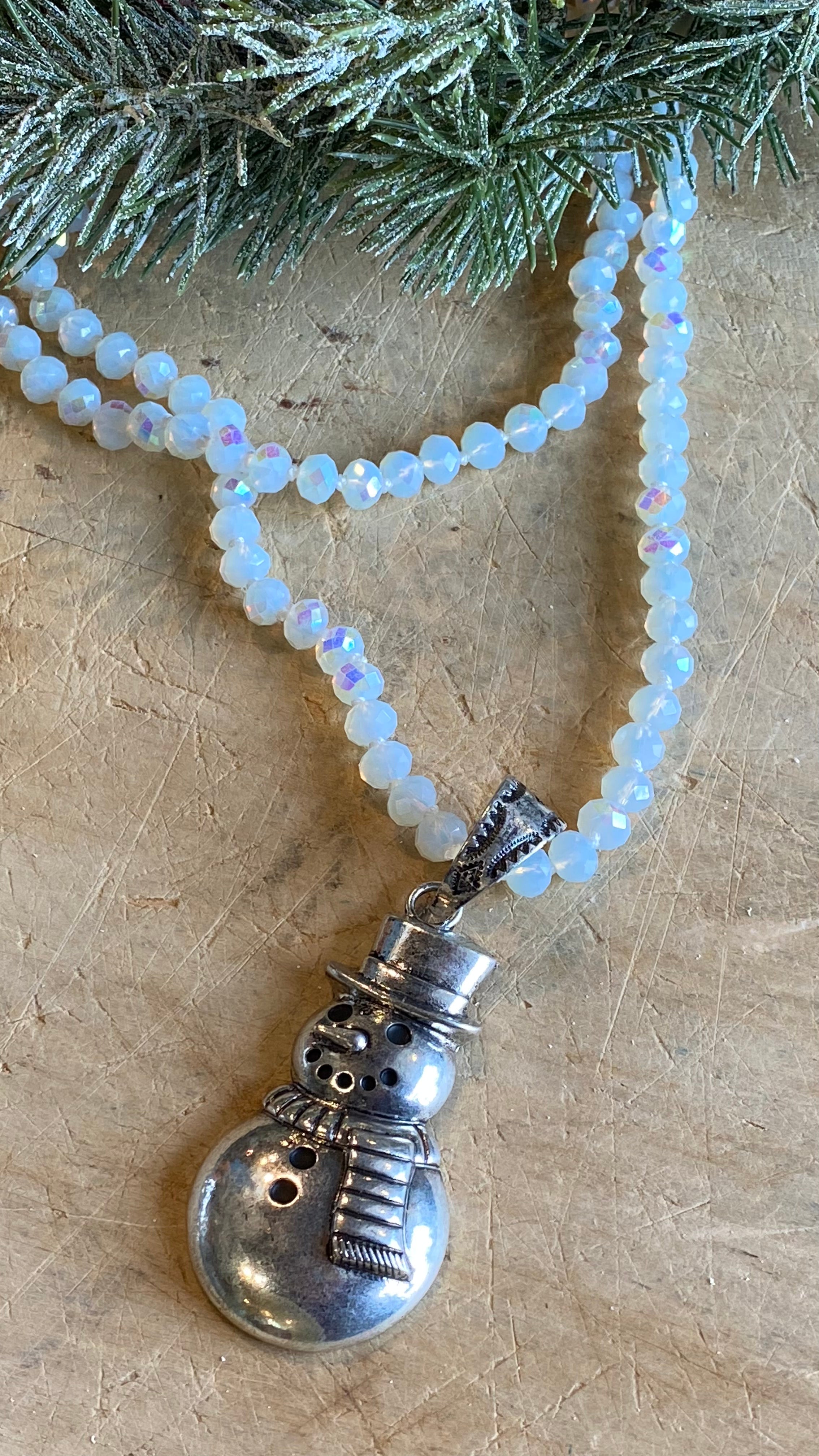 Silver Snowman on Milky Beads