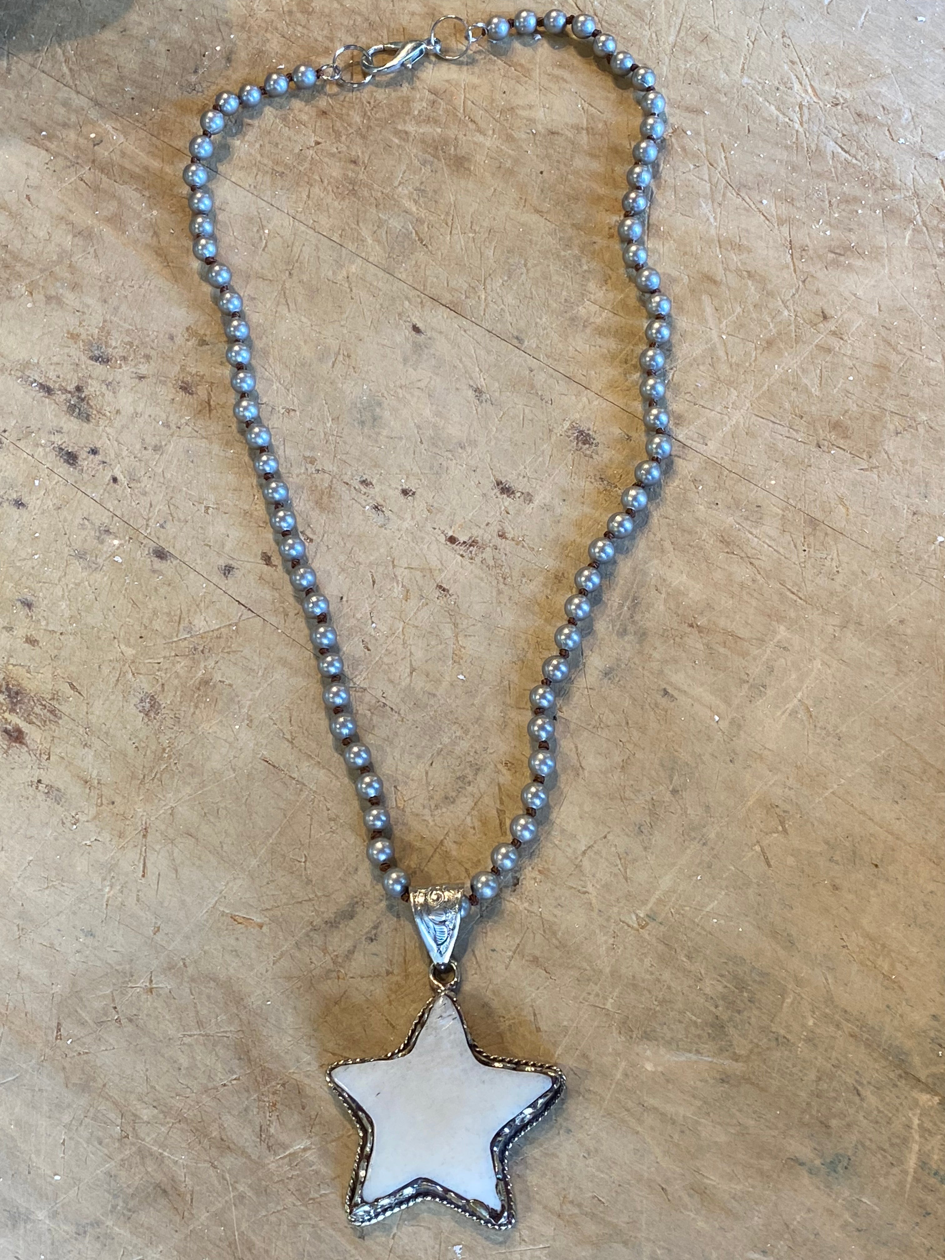 Carved Star Necklace