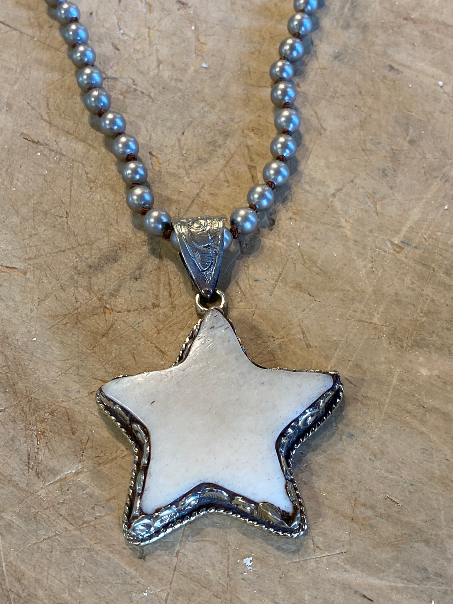 Carved Star Necklace