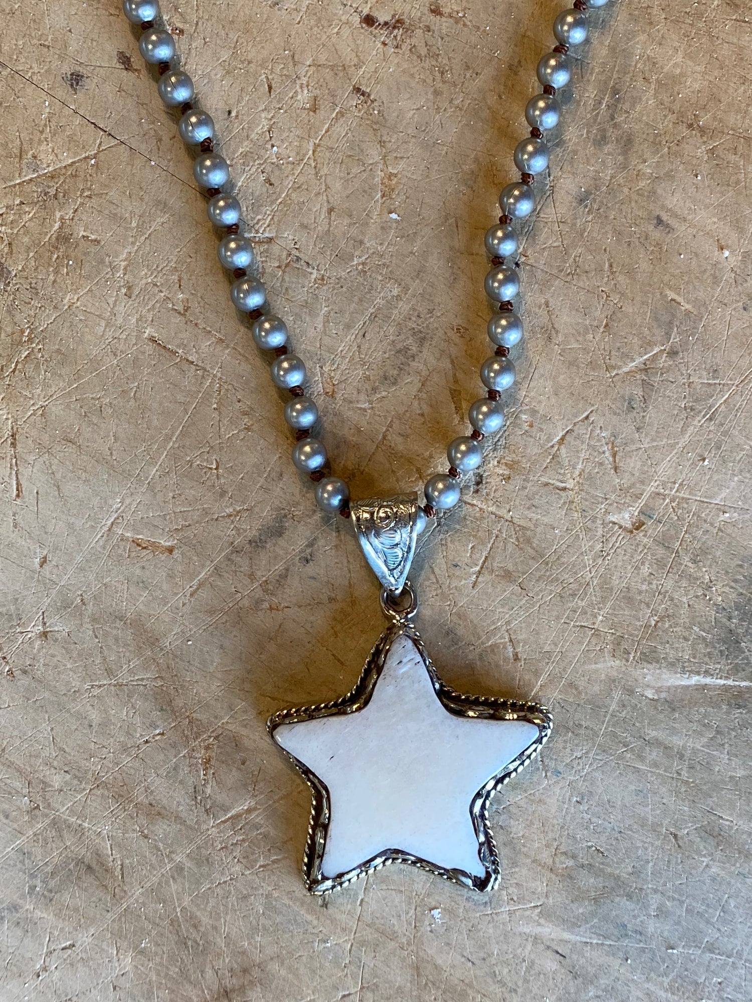 Carved Star Necklace