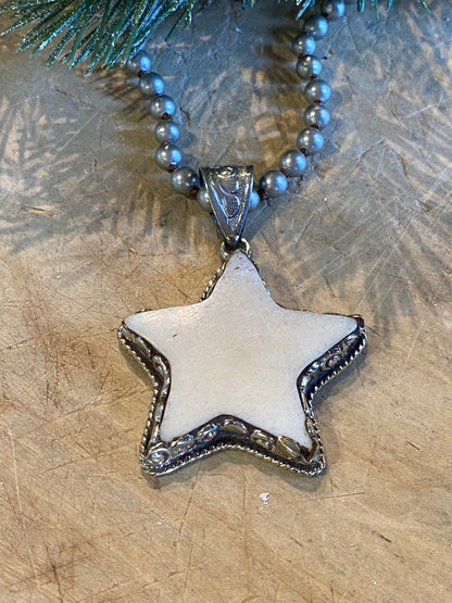 Carved Star Necklace