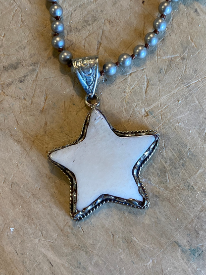 Carved Star Necklace