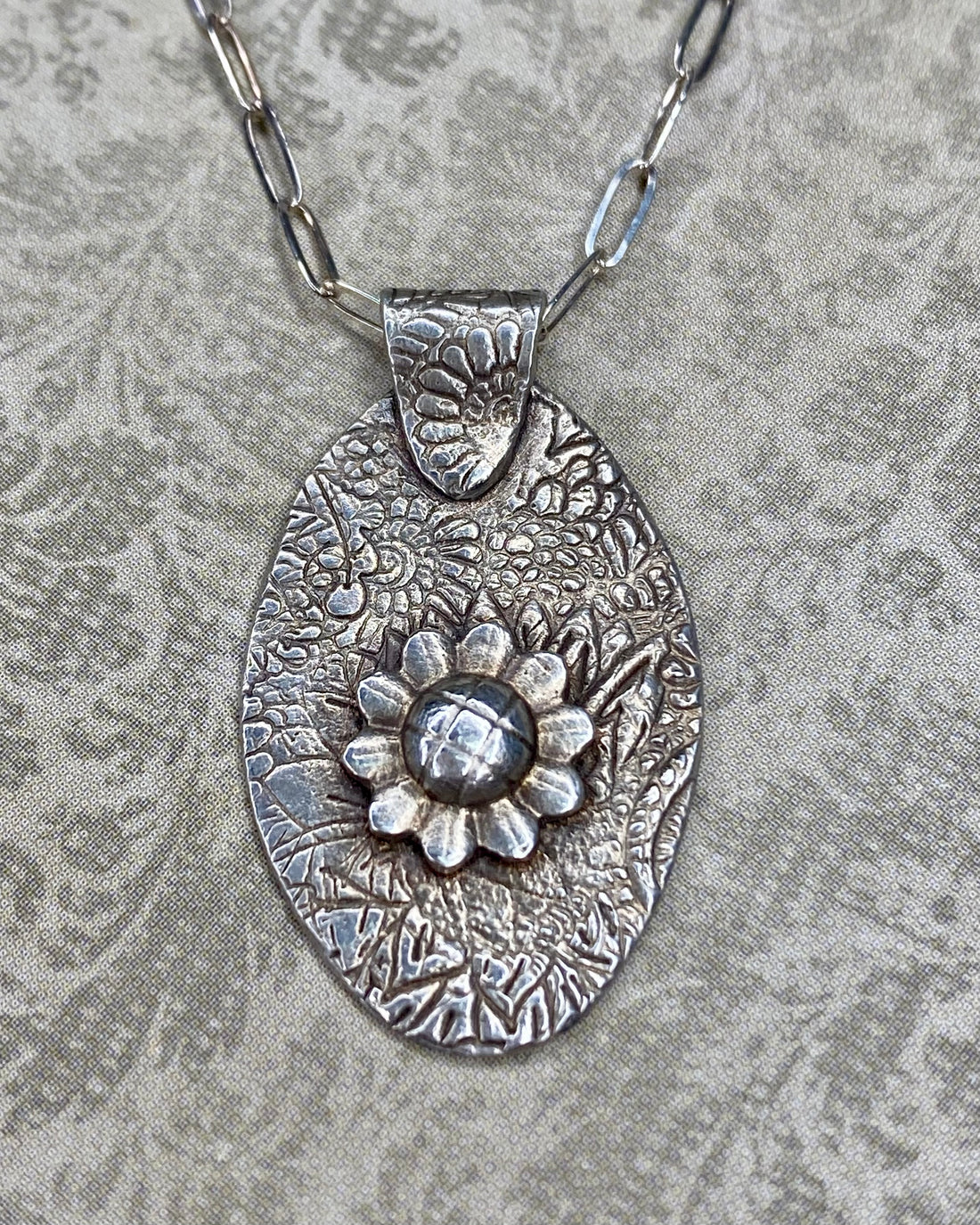 Textured Oval with Flower Necklace