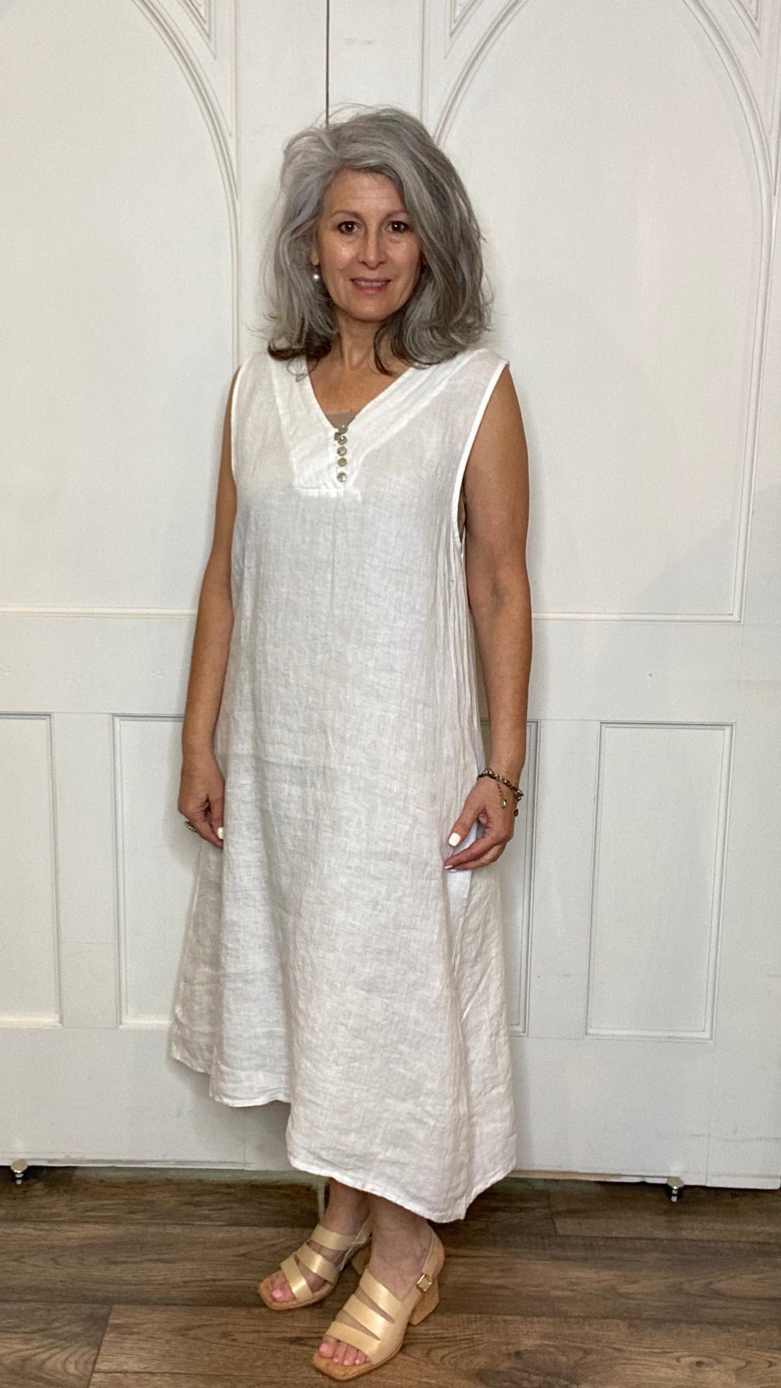 Sleeveless White 5-Button Dress