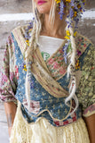 Front view on model of Kalamkari Andhra Jacket cris-crossed by Magnolia Pearl in the color Antigue.