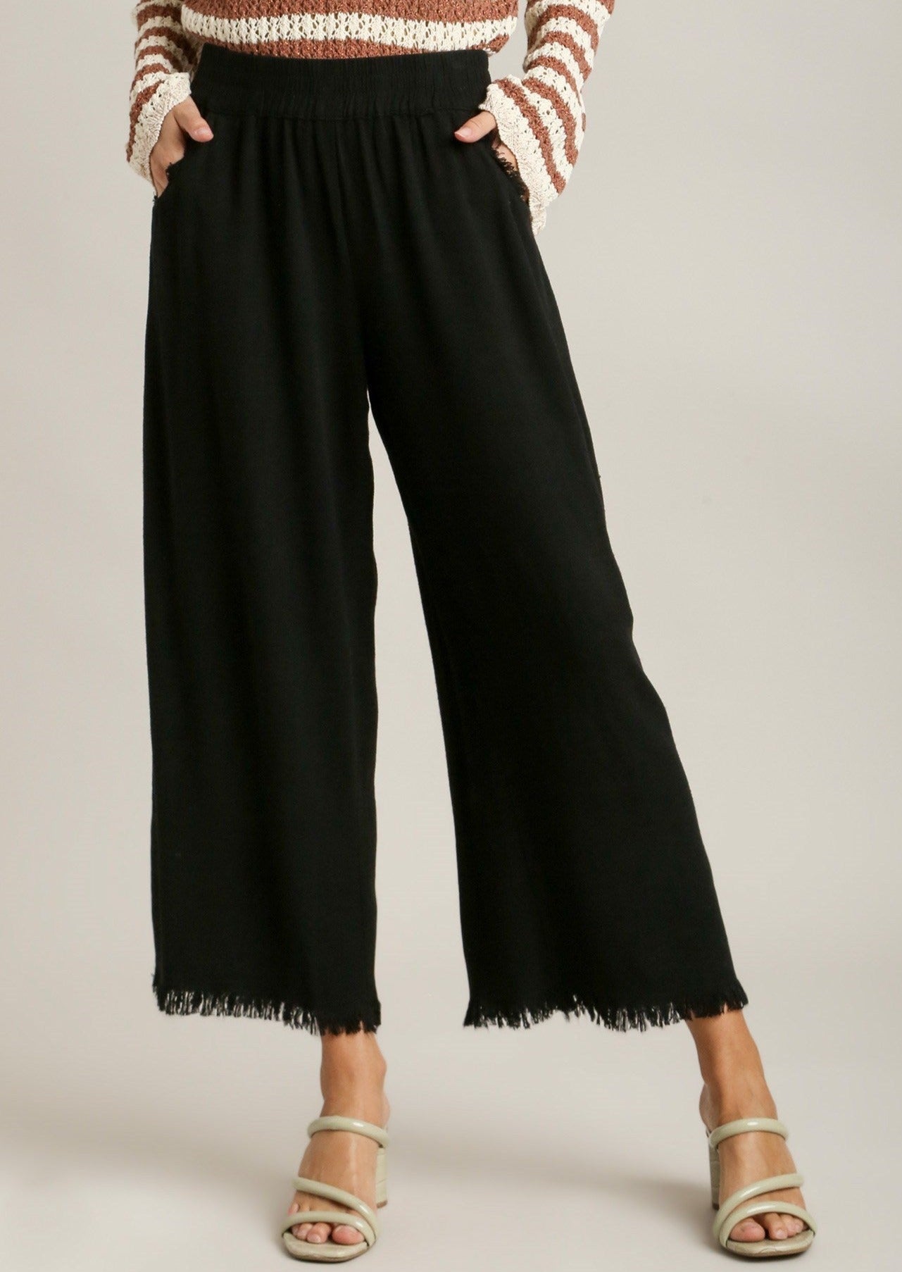 front view of model wearing Linen Blend Elastic Waist Wide Leg Pant in Black.