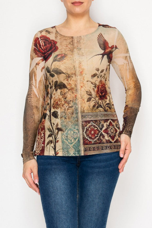 Person wearing a patterned top and blue jeans on a white background